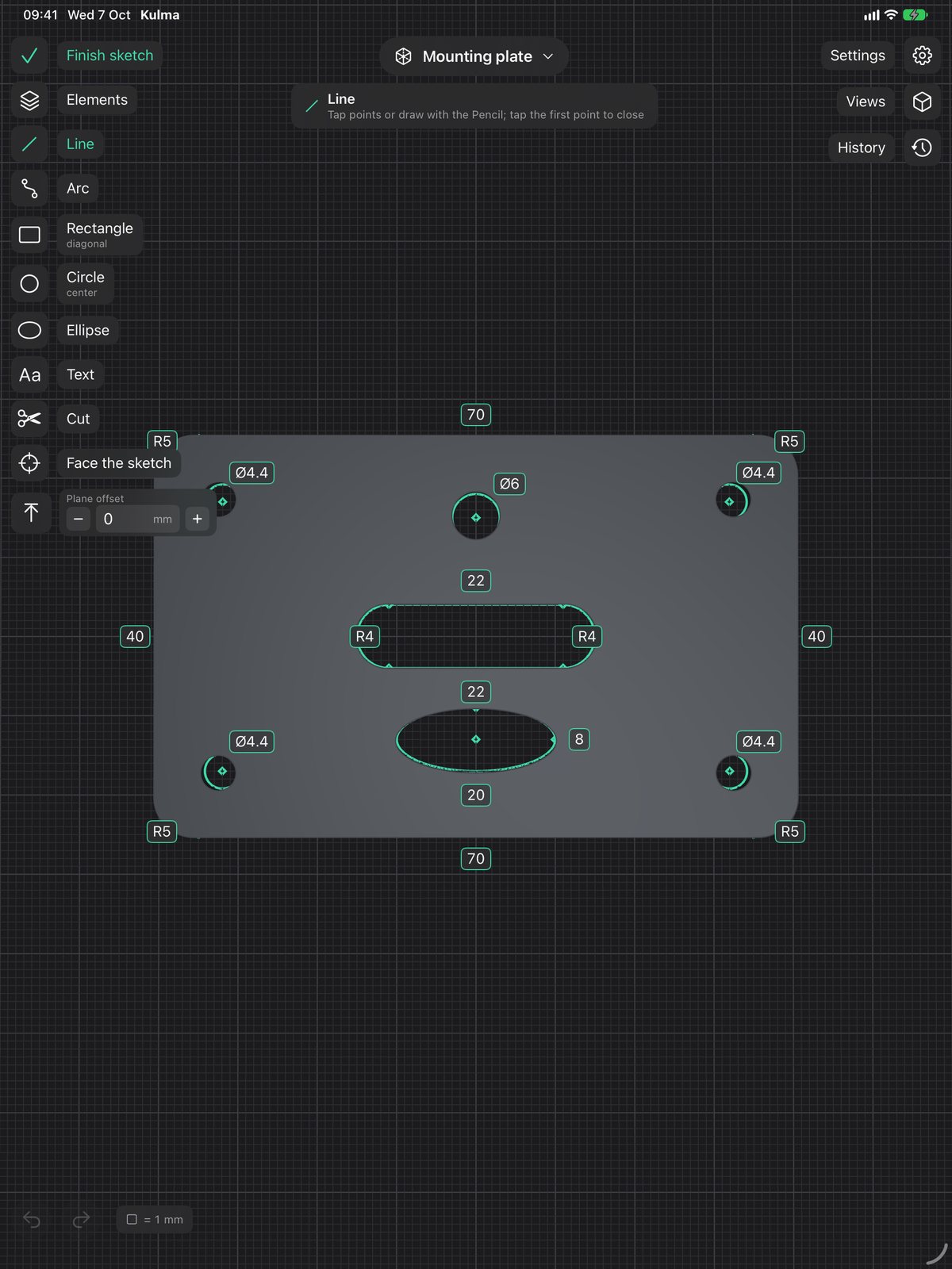 Editing a sketch of a mounting plate, with dimensions on every hole and slot